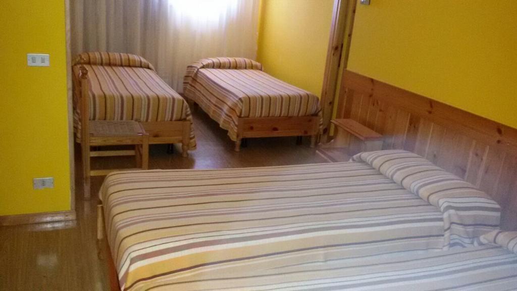 Albergo Trieste Tambre dʼAlpago الغرفة الصورة